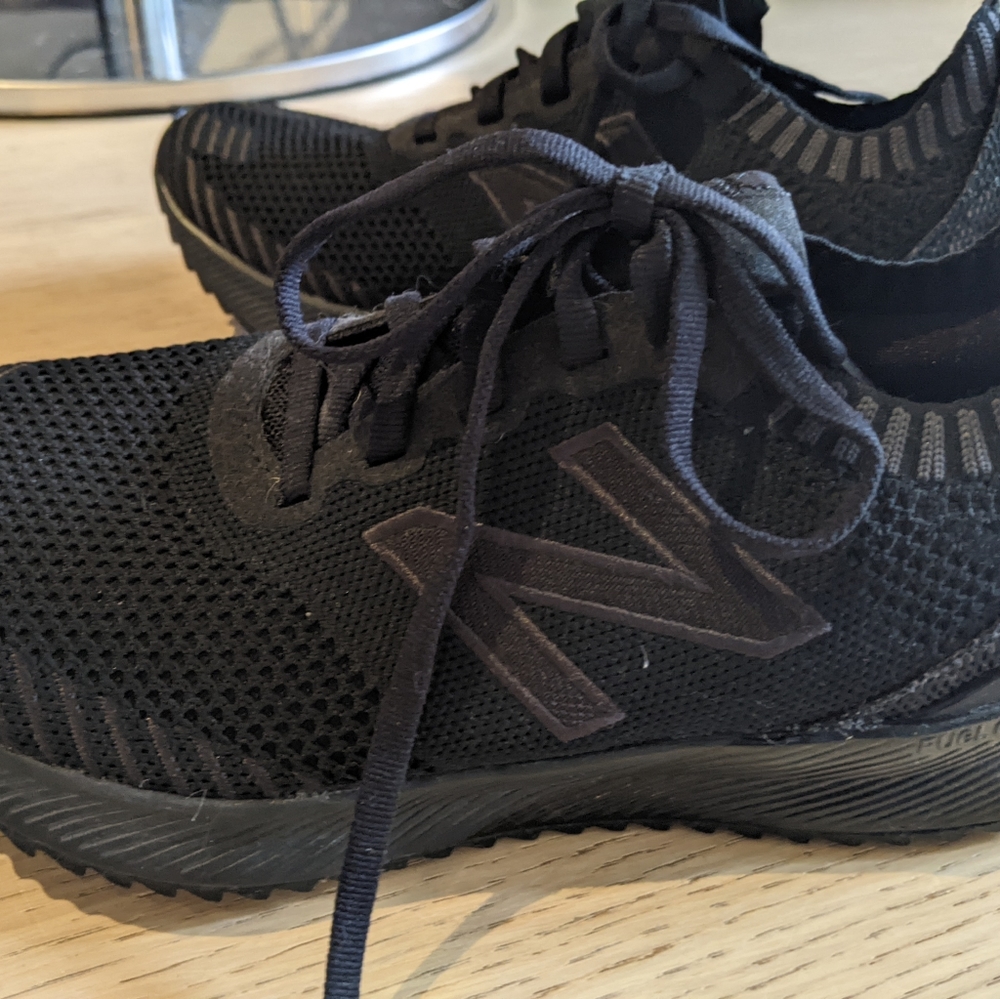 Black New Balance running shoes